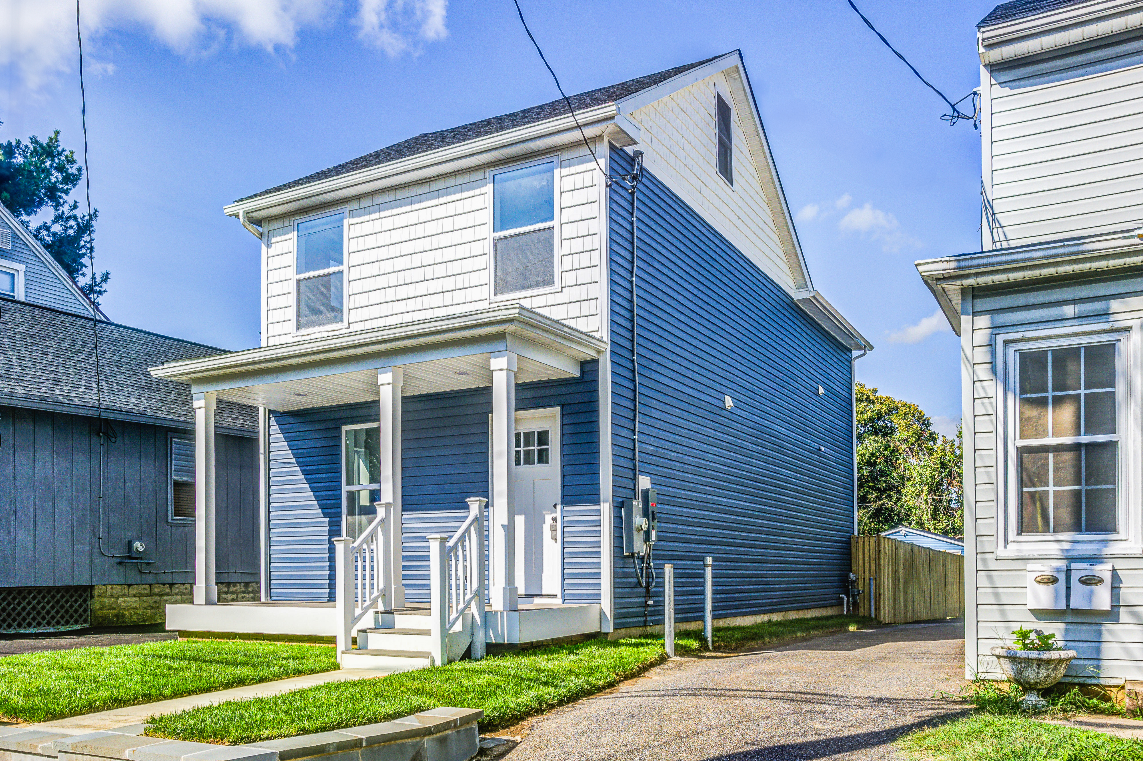 after image of house showing blue siding
