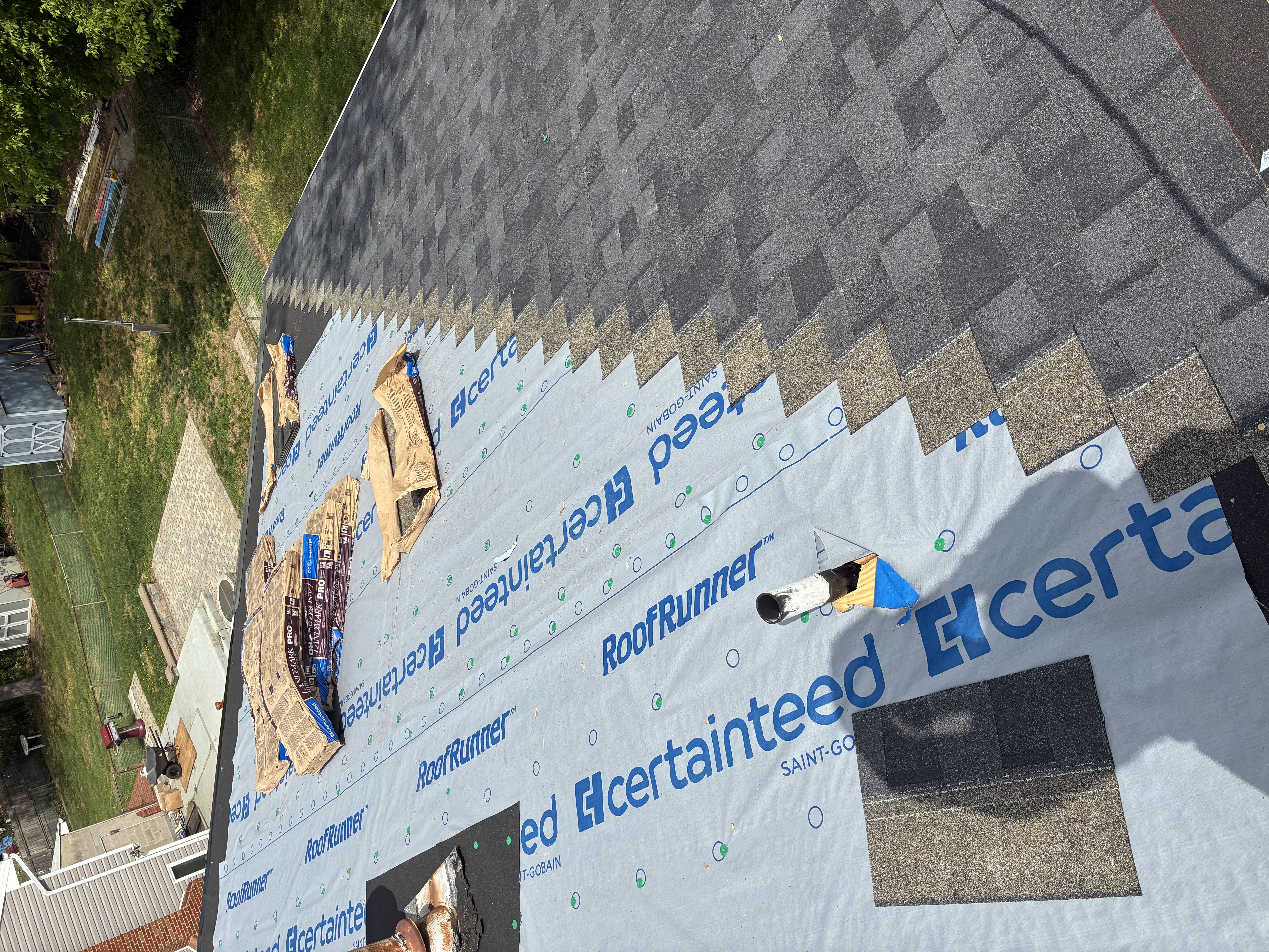roof shingles starting to be installed showing certainteed roof runner