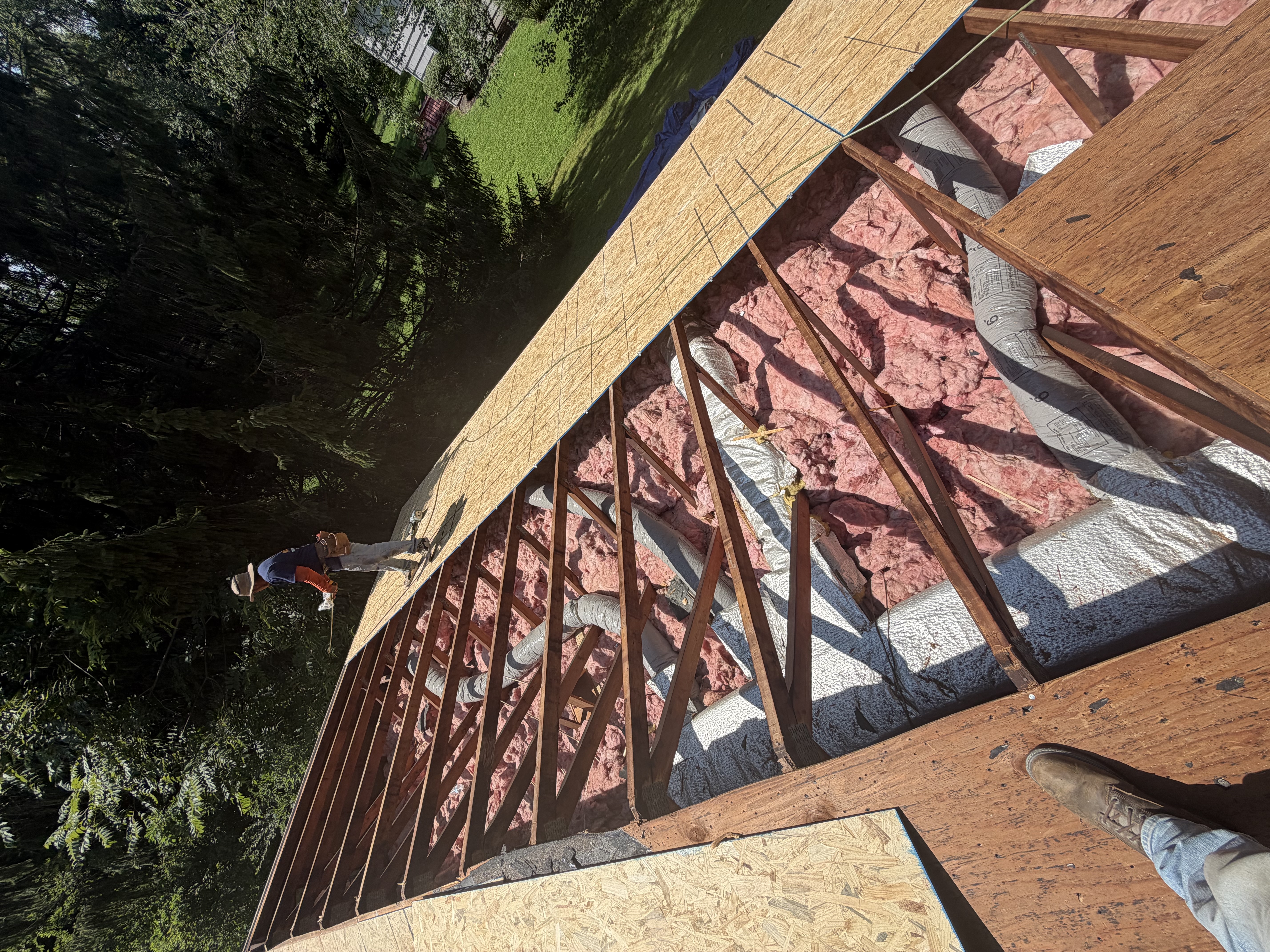exposed rafters after tear off of roof decking