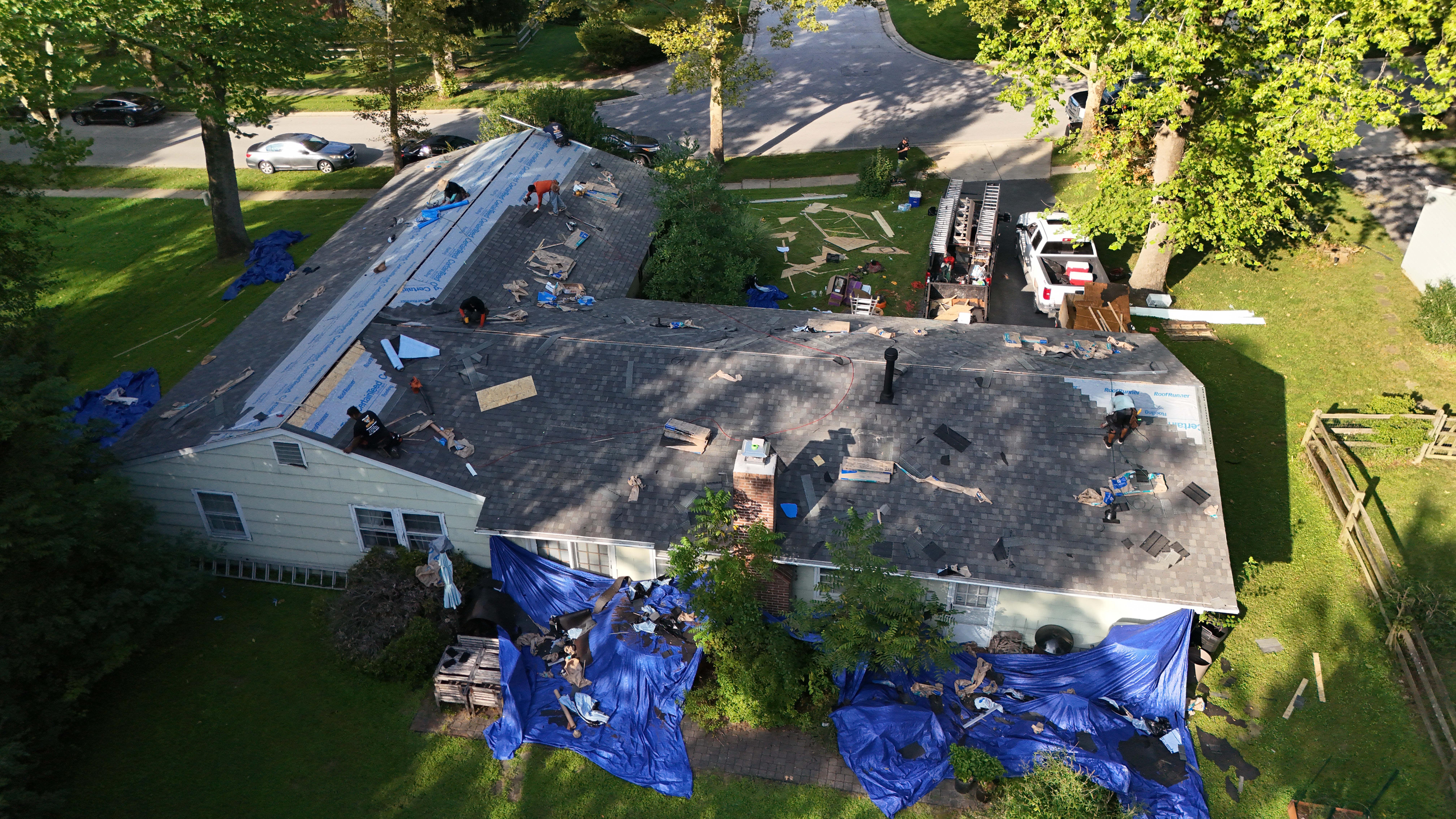Active installation of roof shingles